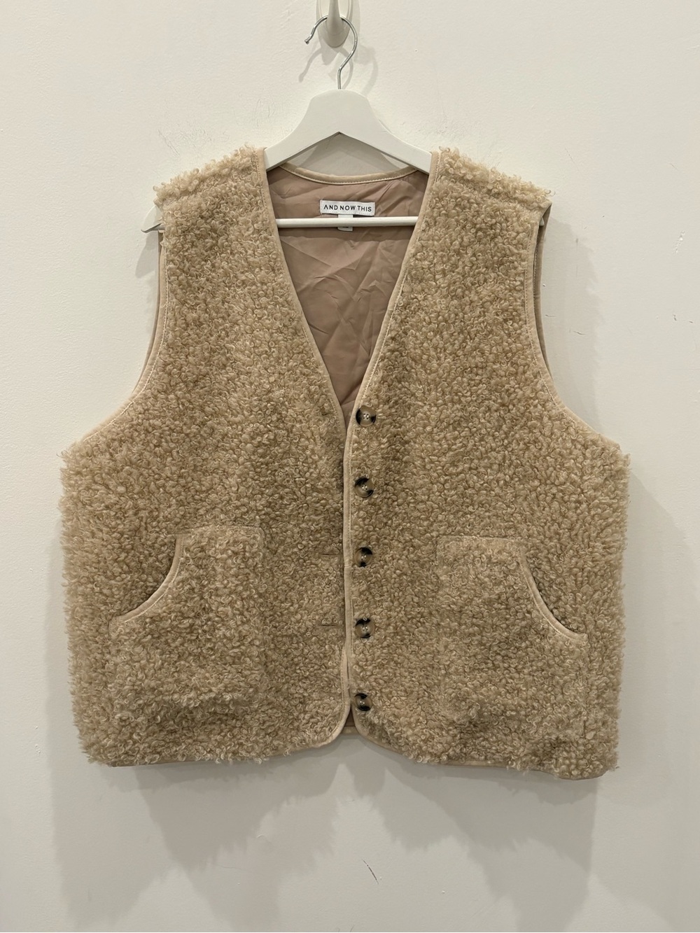 And now this Tan Sherpa Vest sz 1X